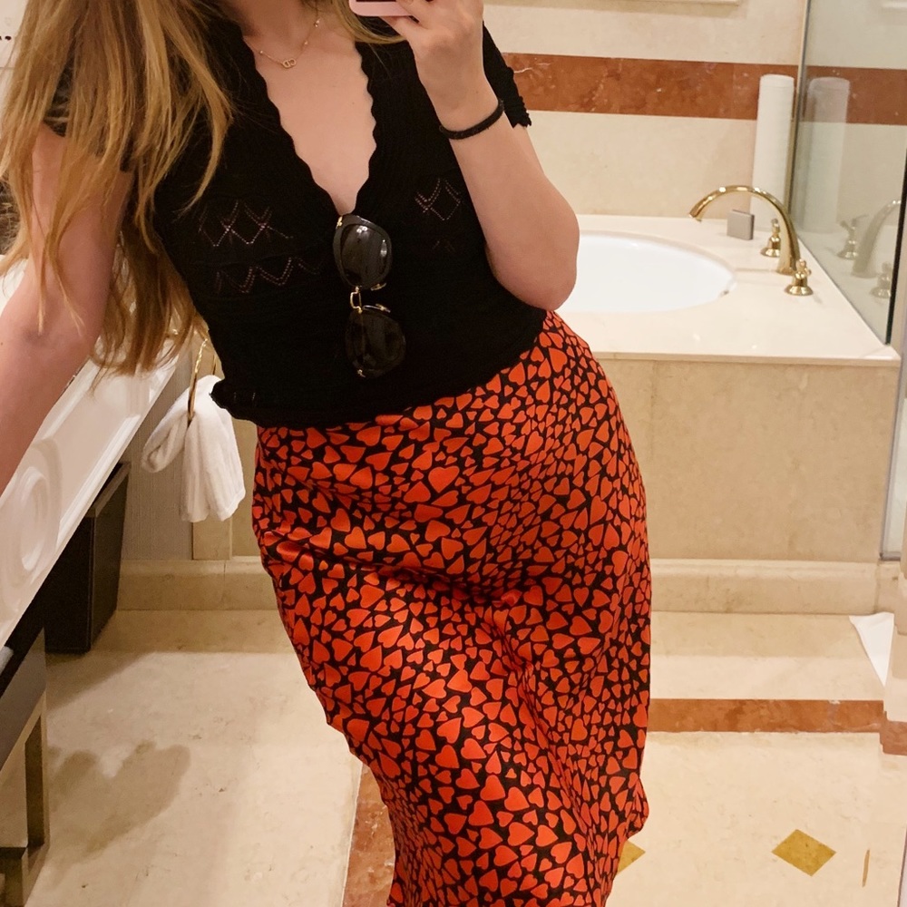 Realizationoar red silk skirt